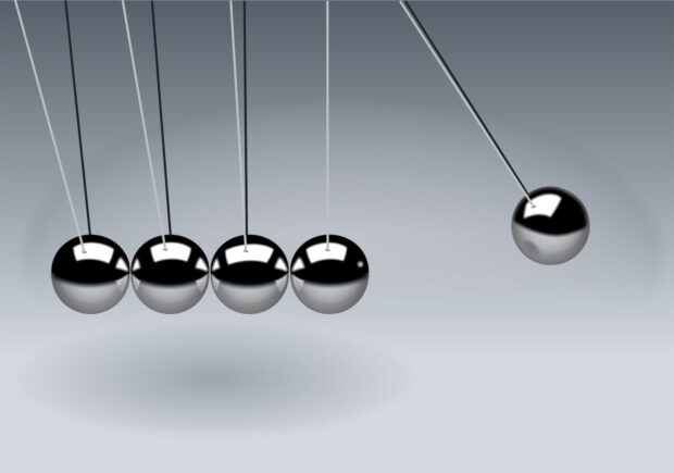 gray newton s cradle in close up photogaphy